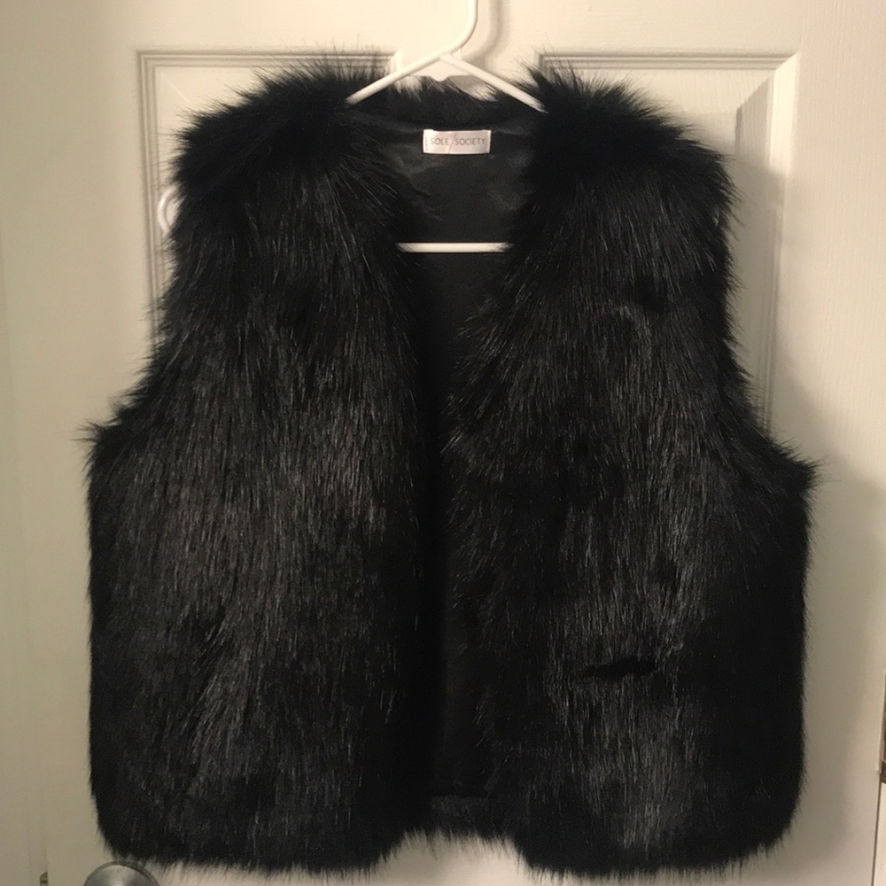 Black faux fur vest